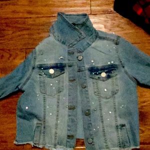 it’s a Jean jacket light blue L in girls